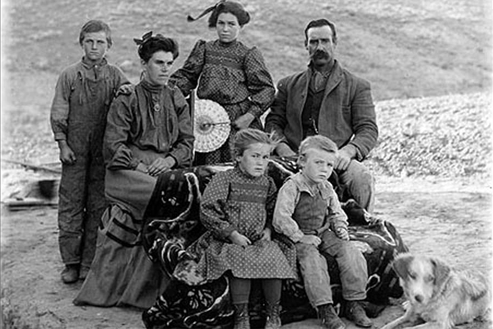 Homesteaders posed in outdoor setting for portrait, probably Washington, ca. 1905