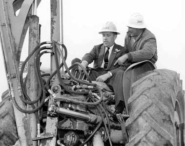 Senator Henry M. Jackson breaking ground in a bulldozer, Plutonium Recycle Test Reactor, Hanford, Washington, ca. early 1960s