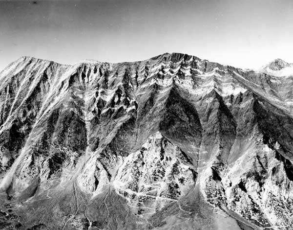 Red Slate Mountain roof pendent. Pennsylvanian fossils reported from the striped rocks by Rinehart and others in GSA Bull for July 1959