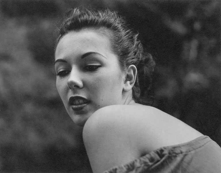 Jane, portrait of a woman looking over her shoulder