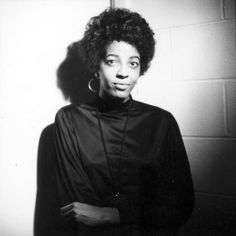 Dee Daniels of Dee Daniels & Dynamite (formerly King Biscuit Entertainers) posing during an indoor photo shoot