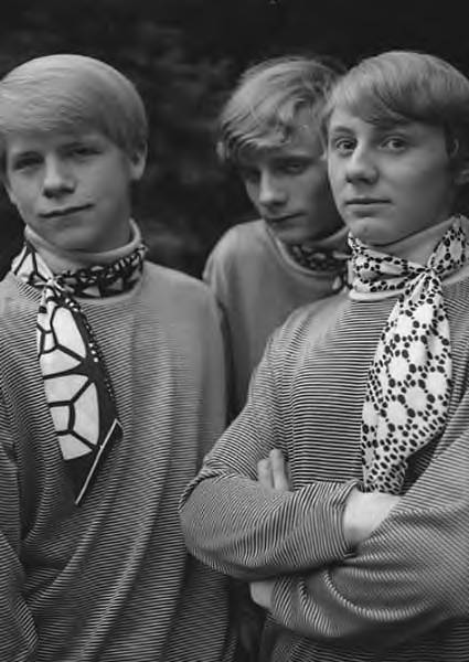 Northwest band Commercial World close up of three band members dressed similarly