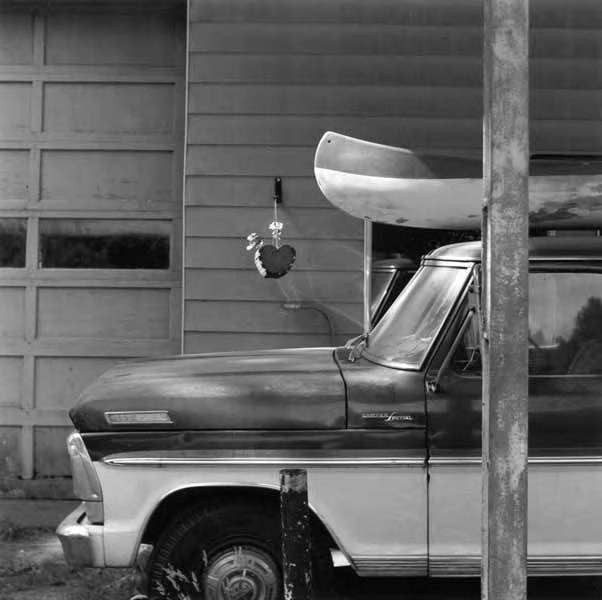 Ford 250 camper with canoe on top