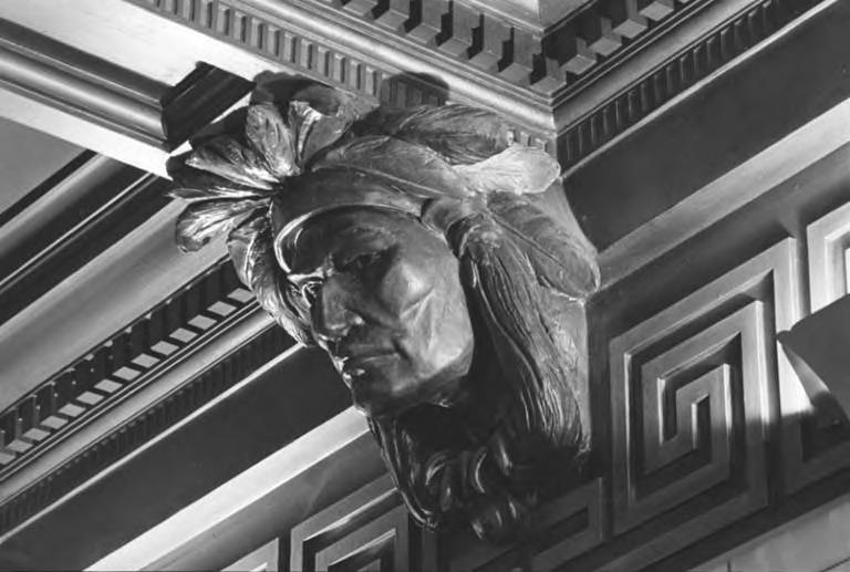 Sculpted Native American decorative heads in the hallway of Smith Tower, Seattle