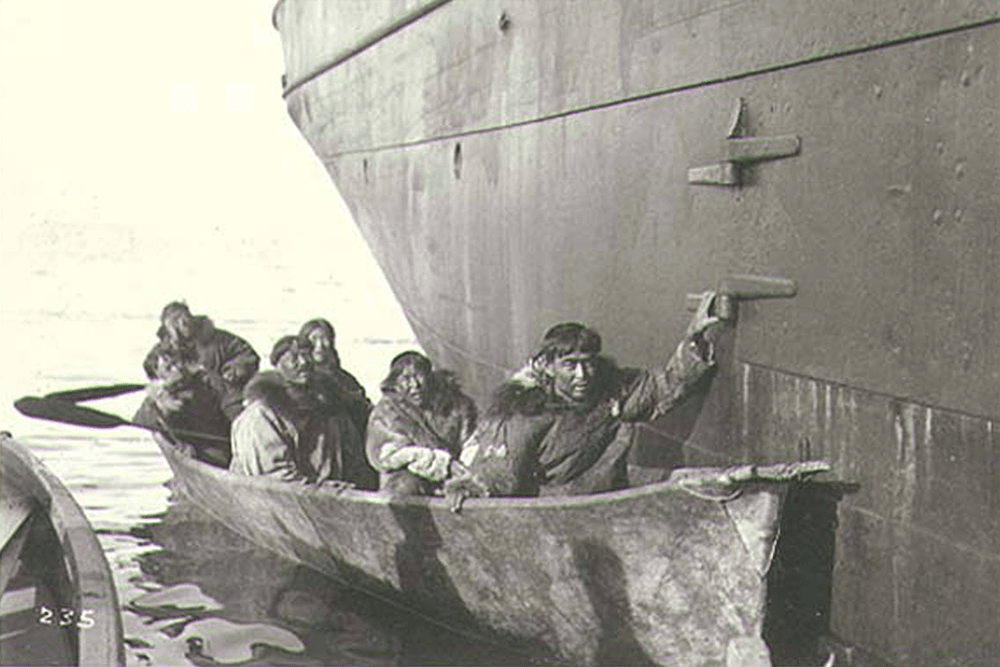 Eskimos in umiaks alongside the GEO. W. ELDER, Plover Bay, Siberia, July 1899.
