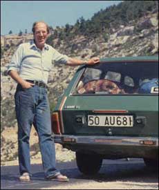 Tony Landreau standing by car