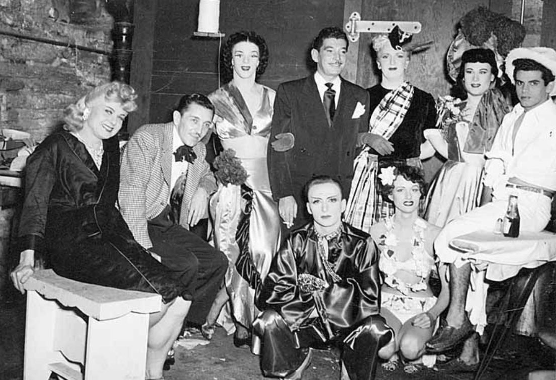 Gita Gilmore, Doc Brewer, Danny Brown and Paris Delare with a group of men and women, Jewel Box Revue, 1946