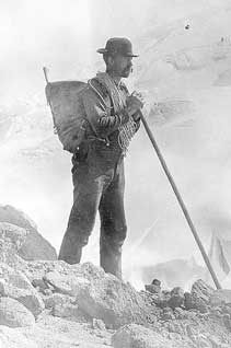 H. M. Sarvant with climbing equipment on the South Mowich Glacier, northwwest slope of Mt. Rainier, August 21, 1896