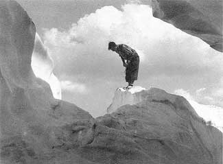 Hiker on an ice crevasse in Lyman Lakes country