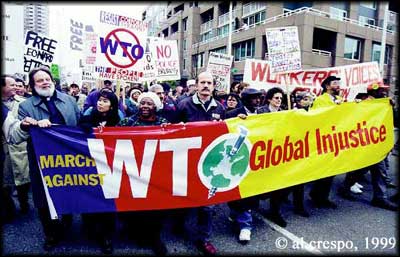 WTO protest banner, photograph by Al Crespo, 1999
